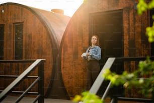 a woman standing in a doorway of a building