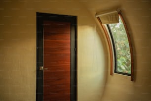 a door and window in a small room
