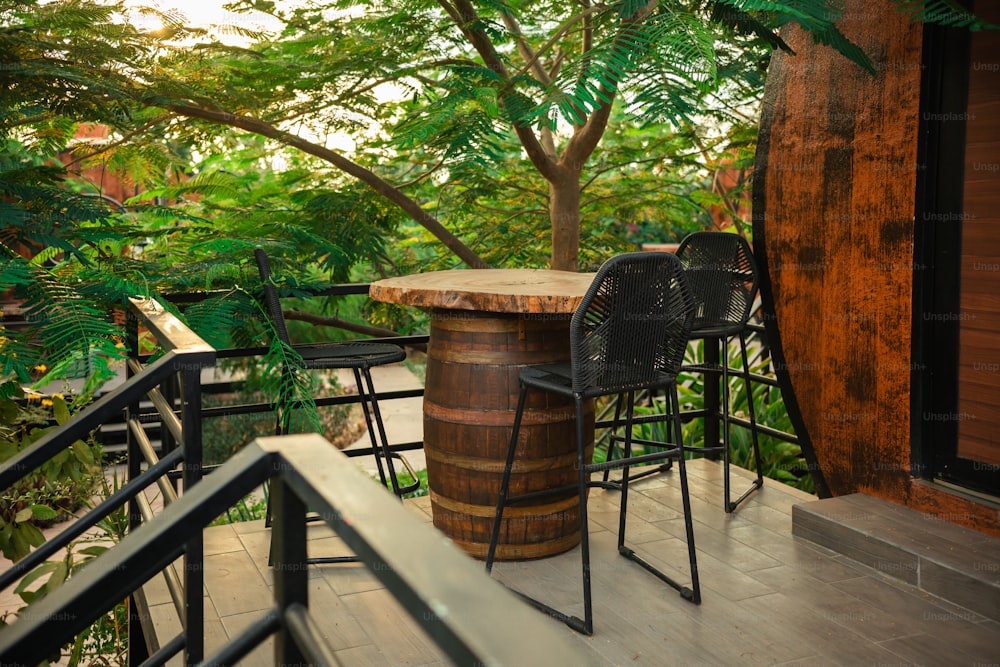 a wooden barrel sitting on top of a wooden table