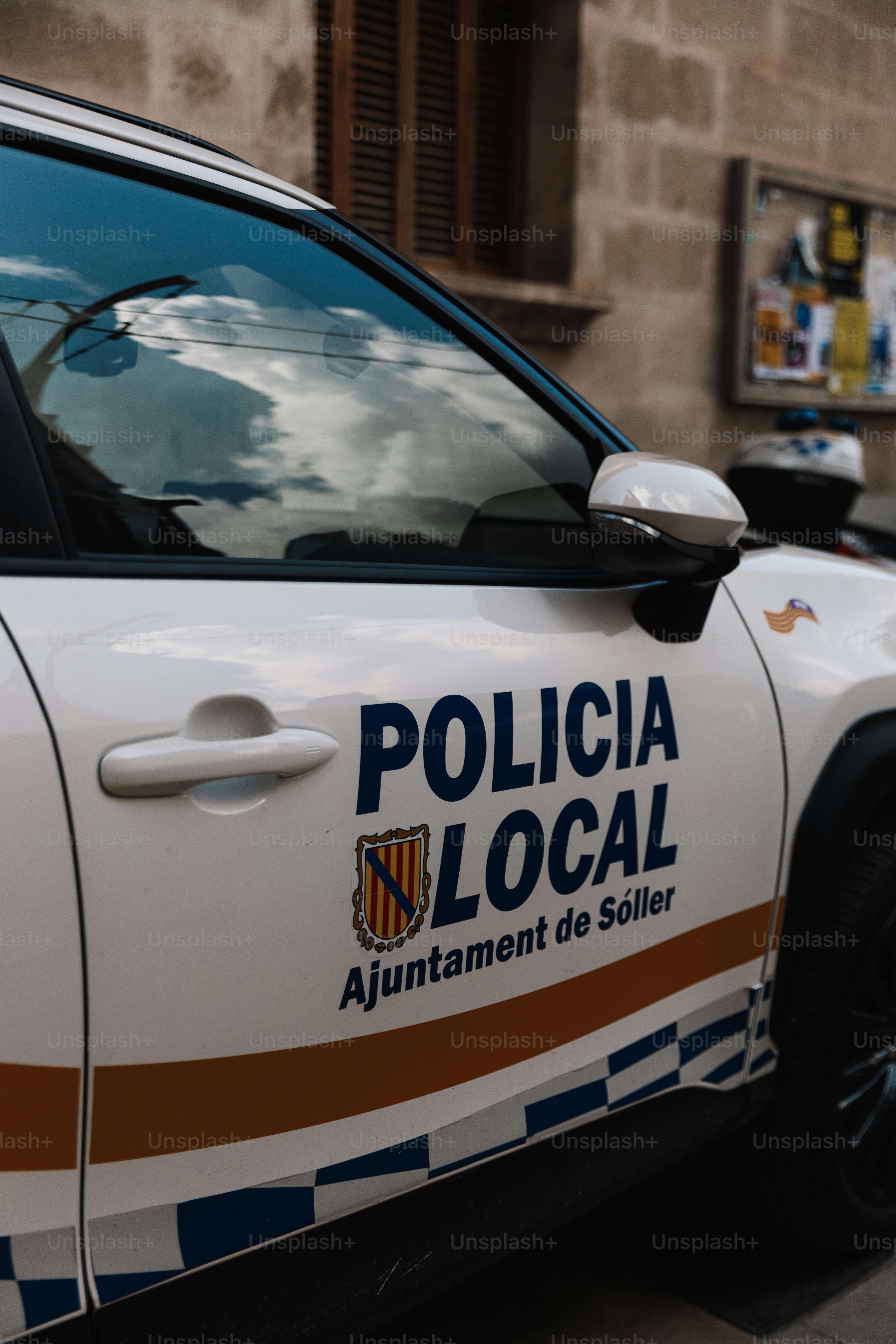 a police car parked on the side of the road