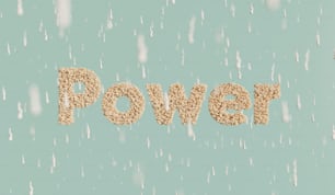 the word power written in sand on a blue background