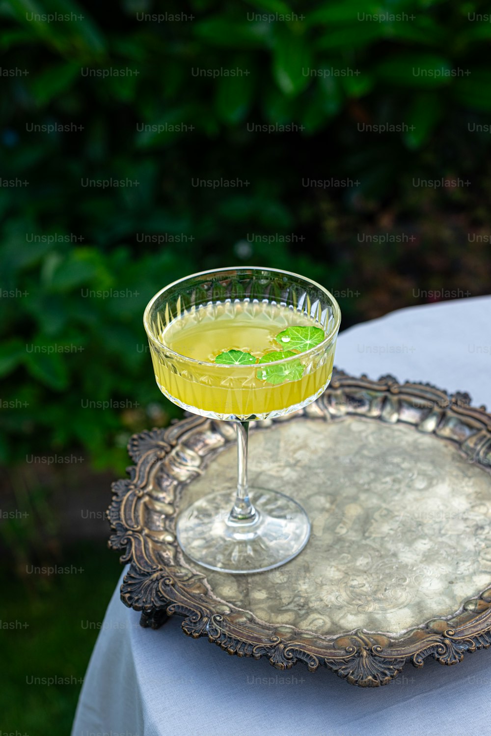 a drink sitting on a tray on a table