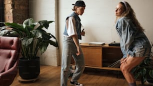 a couple of women standing next to each other