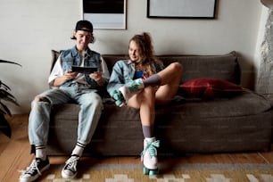 a man and a woman sitting on a couch