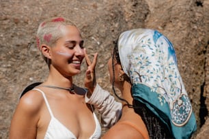 a couple of women standing next to each other