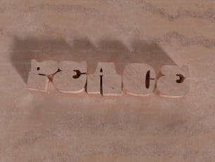 テーブルの上に座っている木の文字で作られた単語