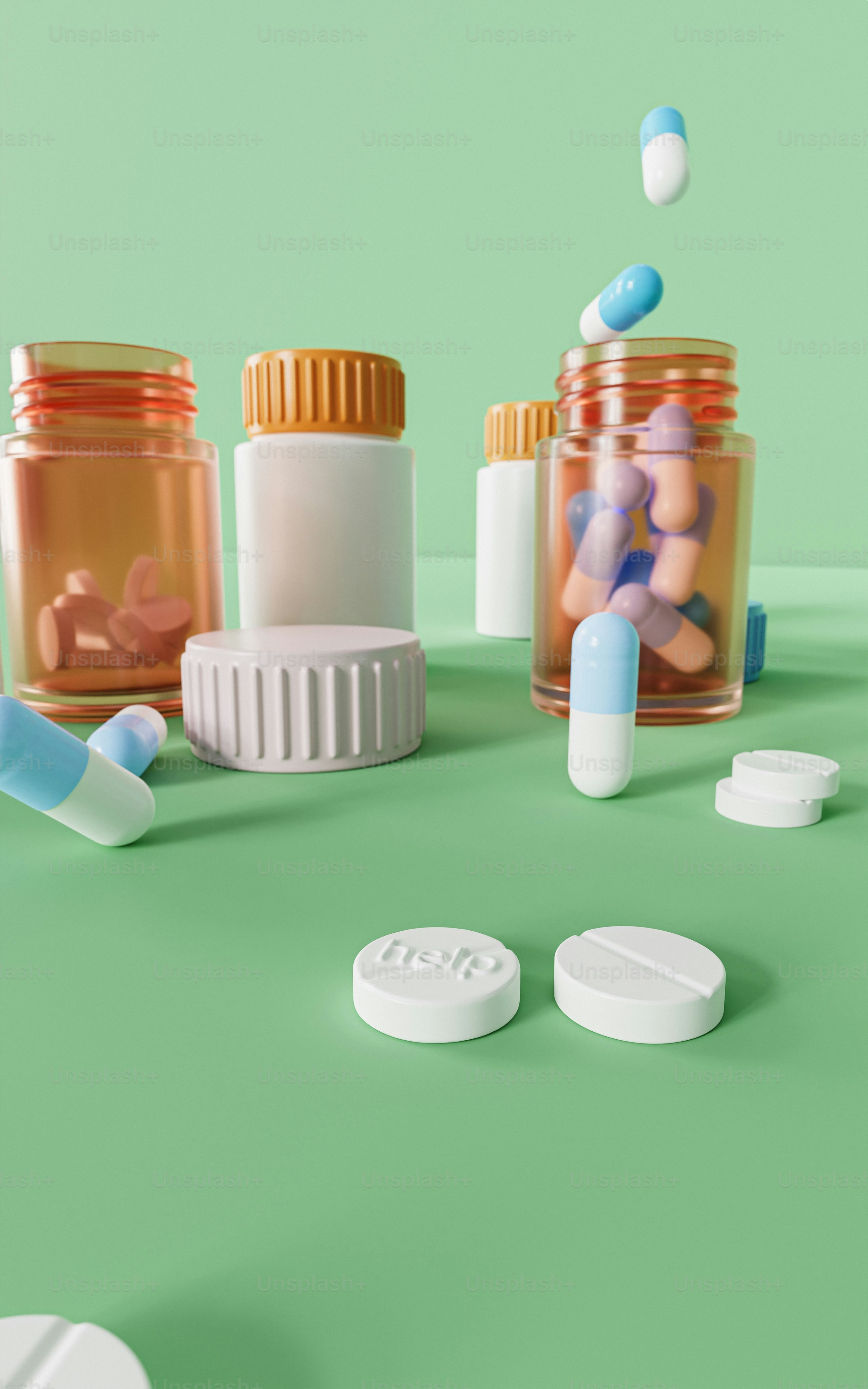 pills spilling out of a jar onto a green surface
