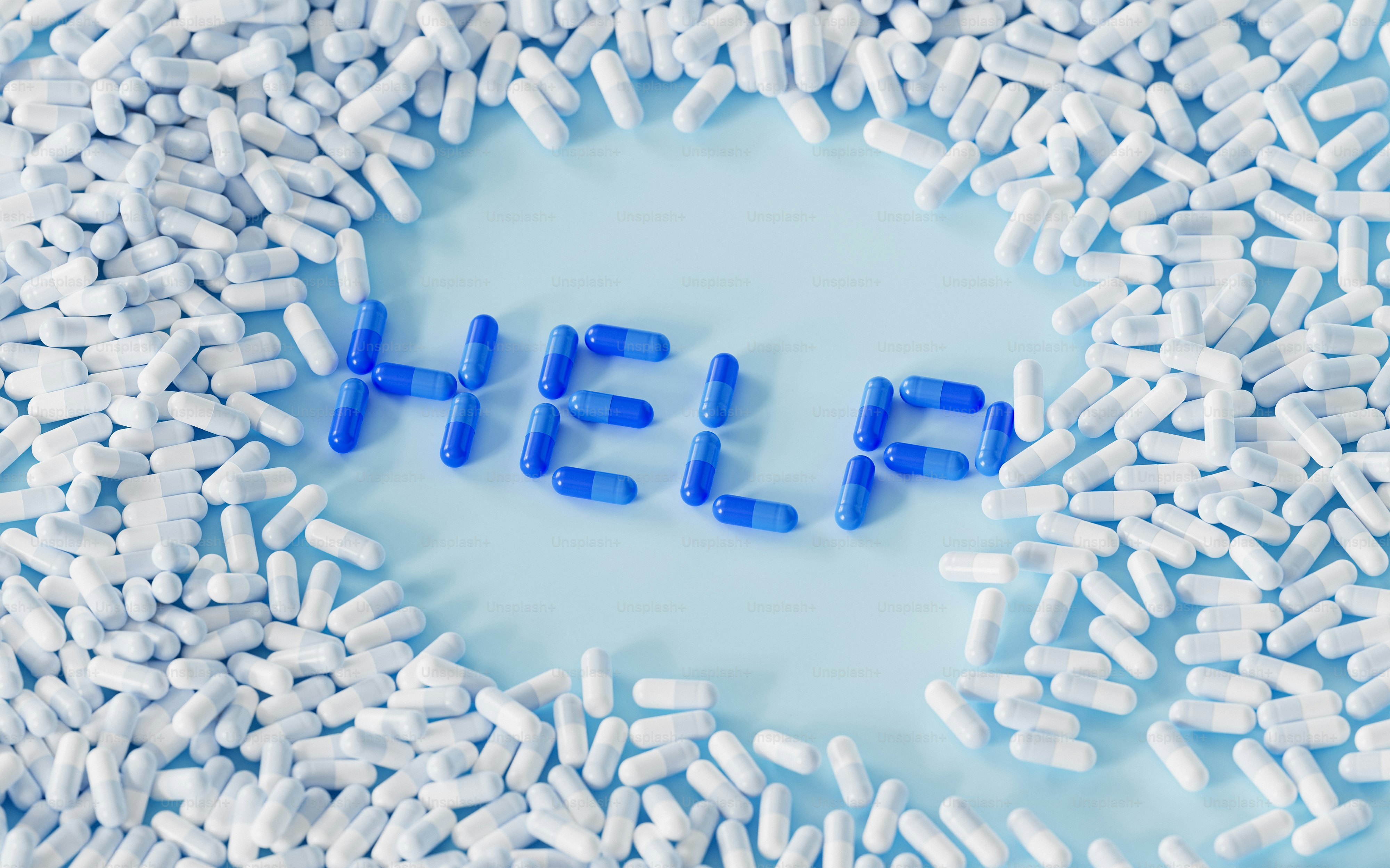 a circle of pills with the word help spelled in it