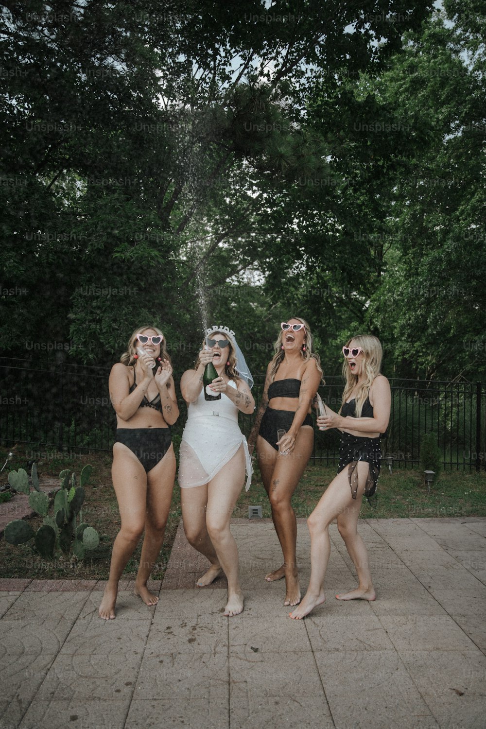 a group of women standing next to each other