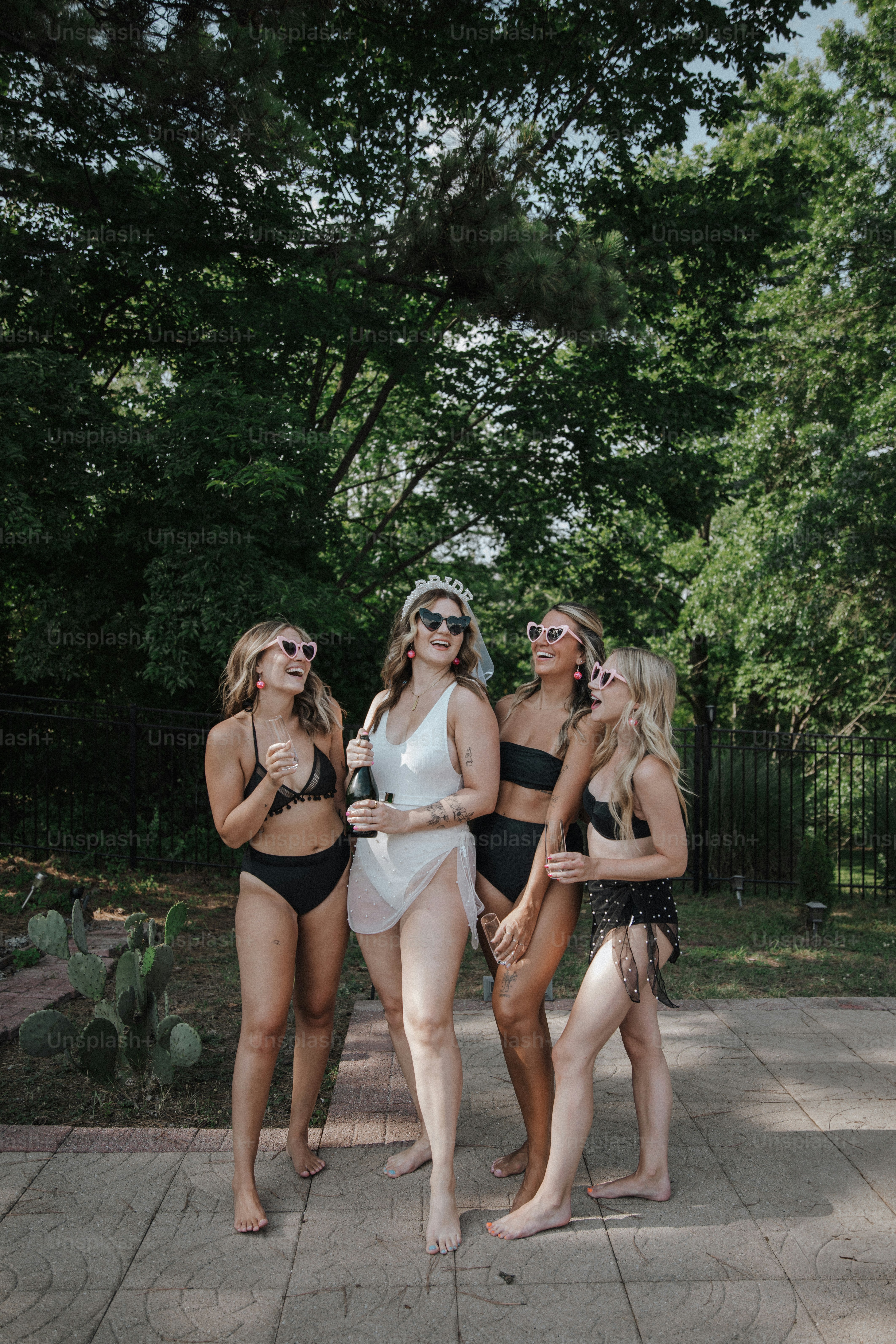 a group of women standing next to each other