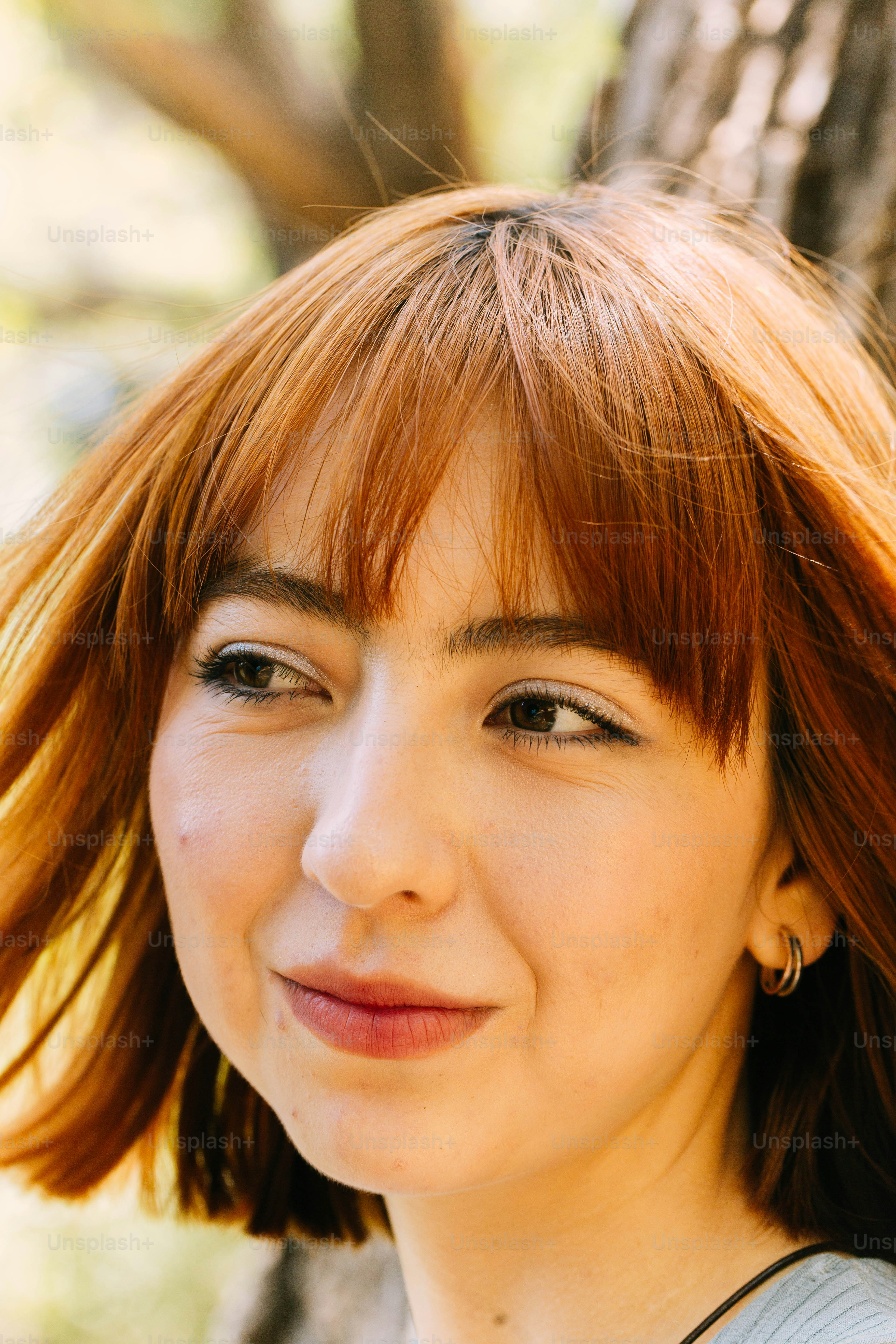 a close up of a person with a cell phone