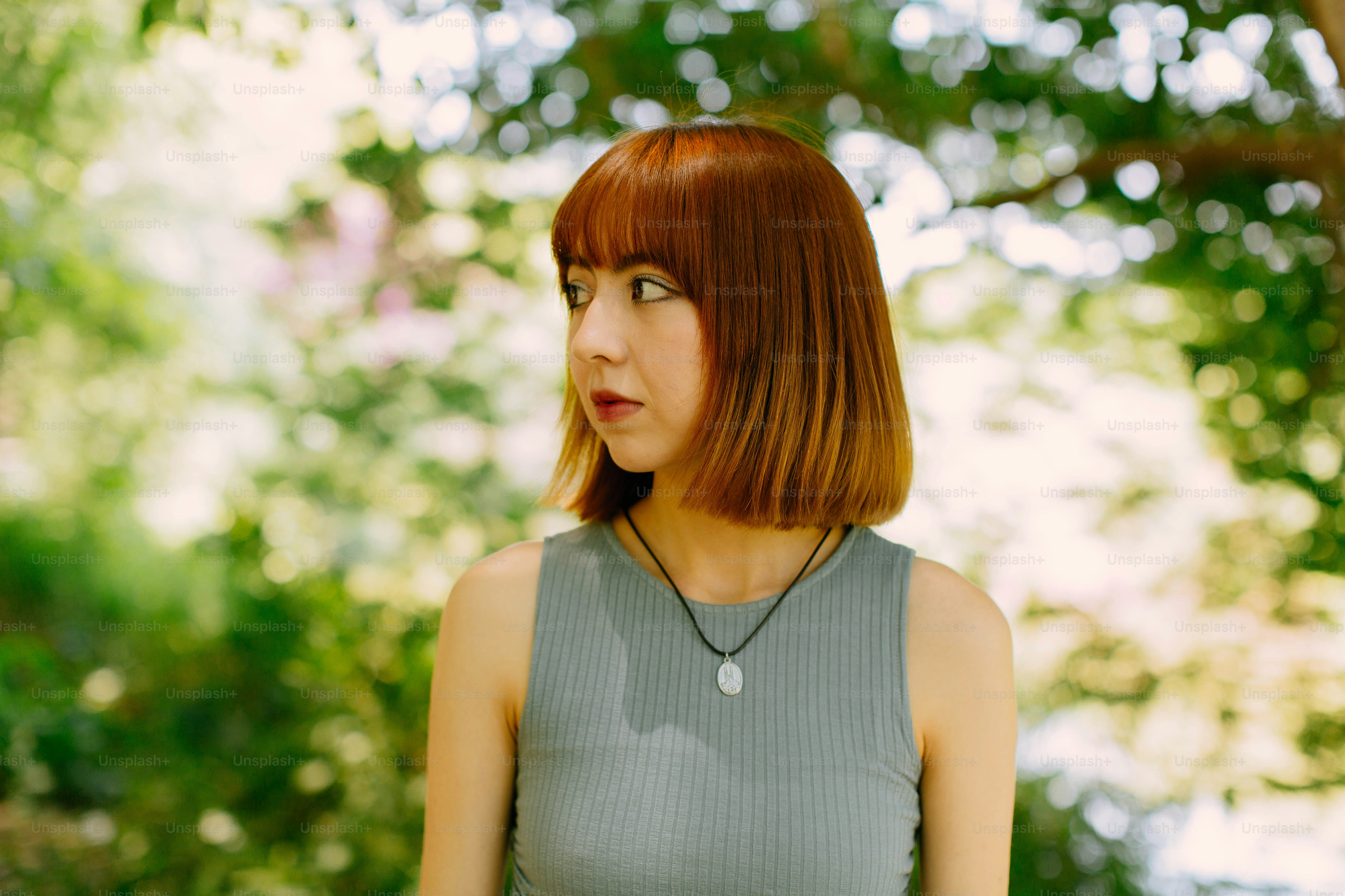 A close up of a woman with red hair photo – Portrait Image on Unsplash