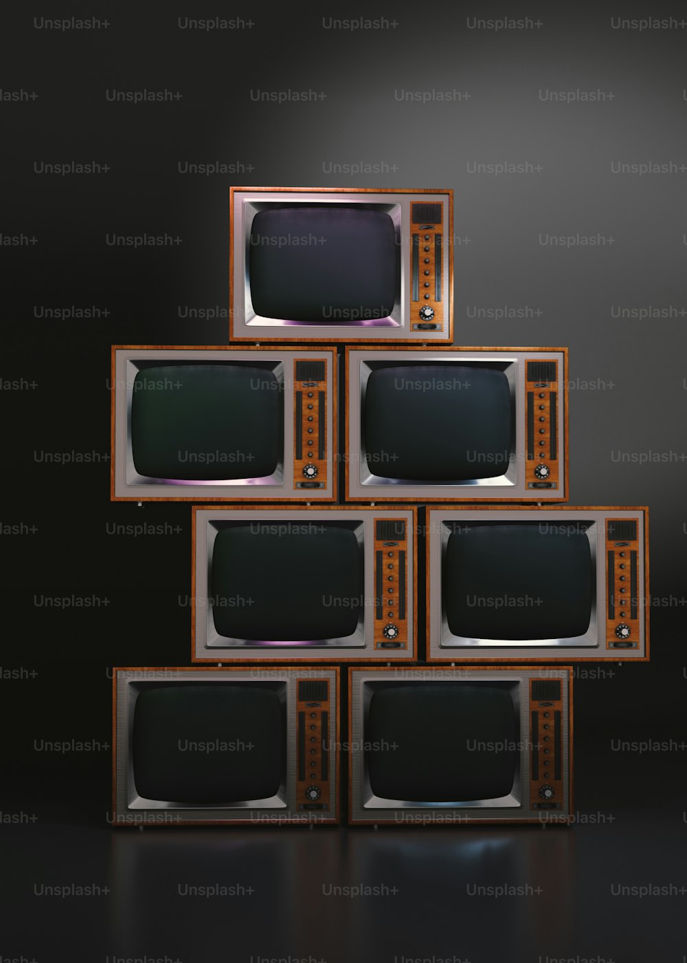 a stack of televisions sitting on top of each other