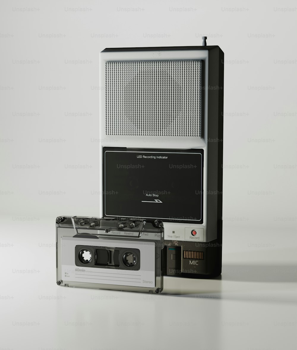 an old fashioned radio sitting next to a cassette player