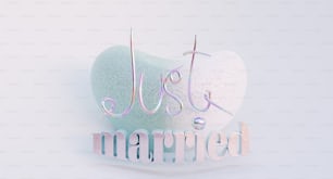 a heart shaped object with the word just married written on it