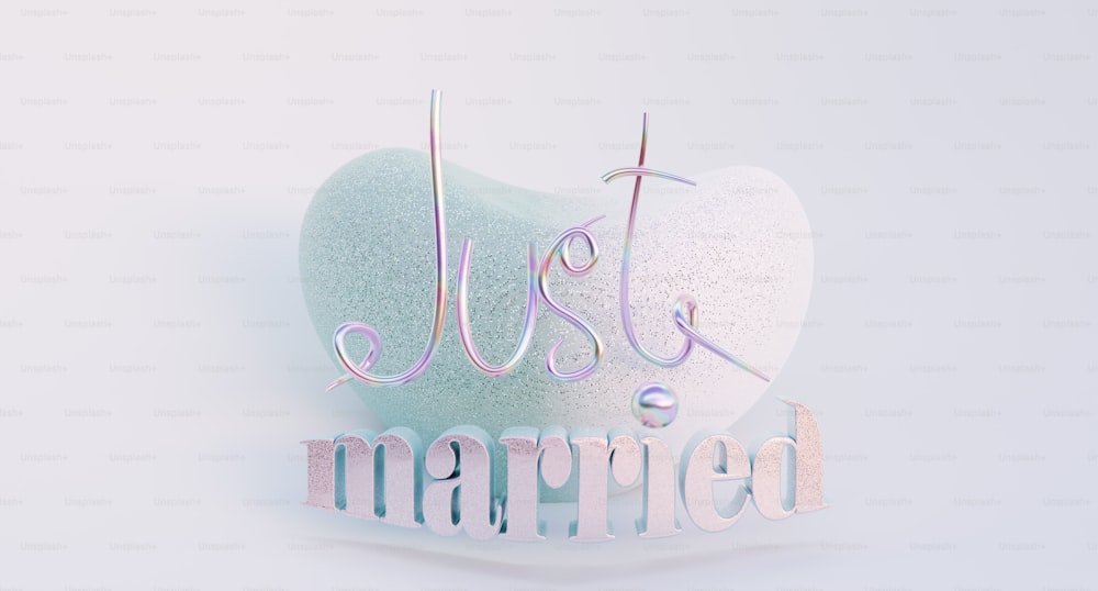 a heart shaped object with the word just married written on it