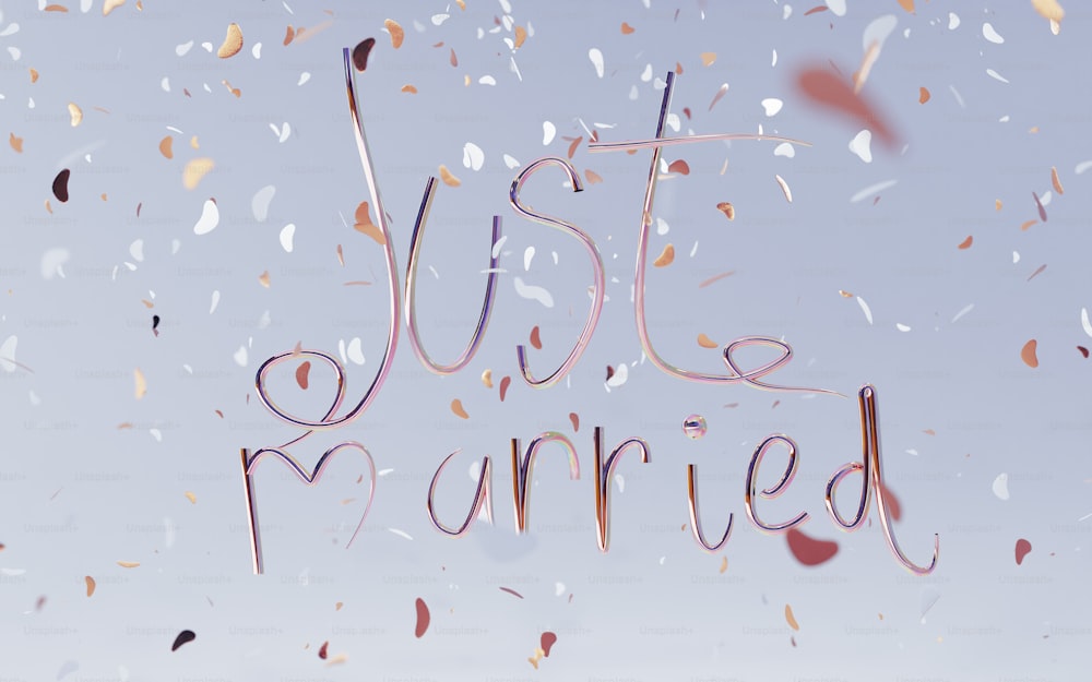 the words just married are surrounded by confetti