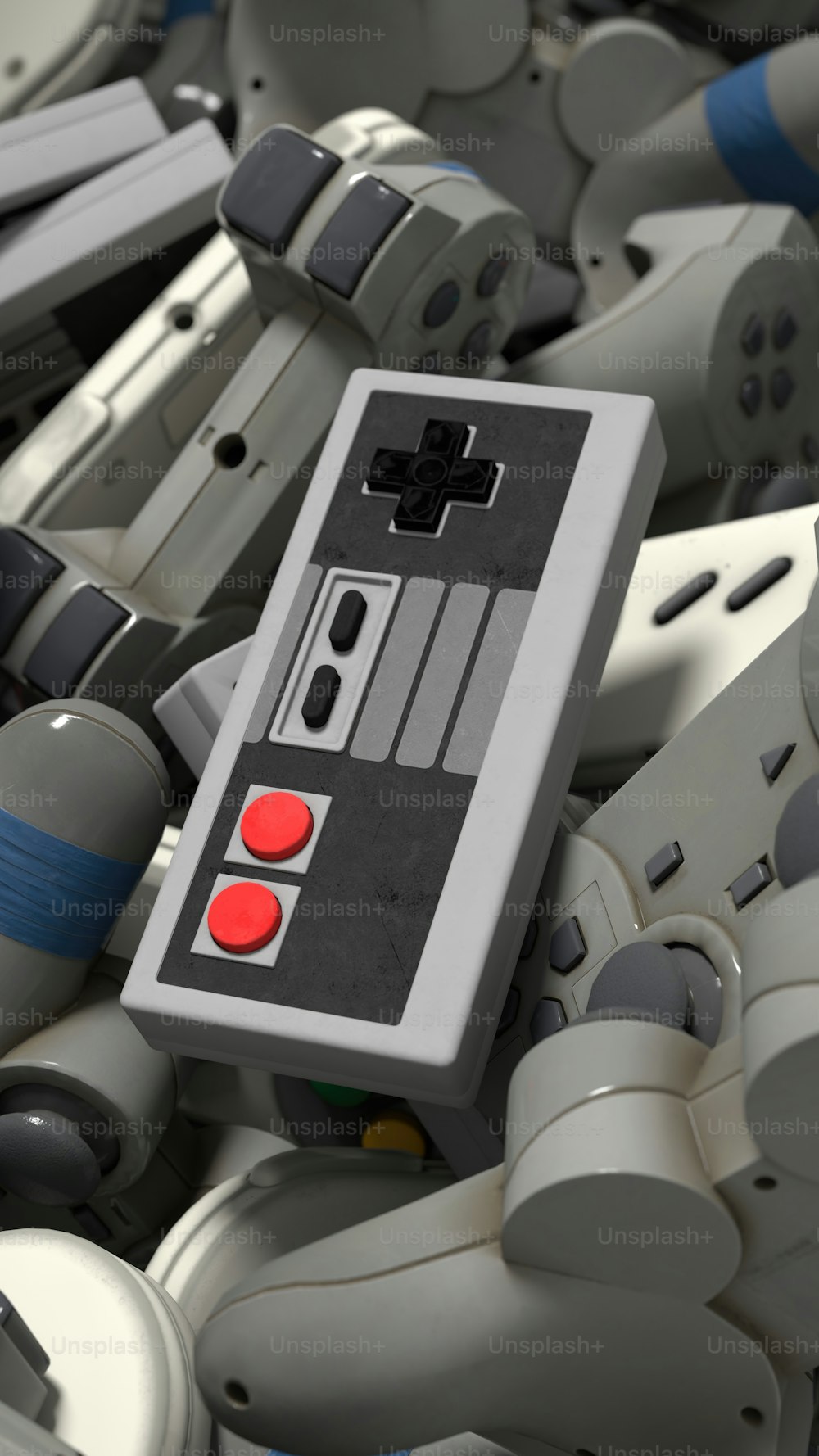Un primo piano di un controller Nintendo circondato da altri controller Nintendo