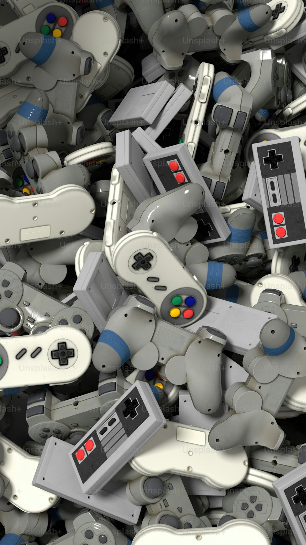a pile of video game controllers sitting next to each other