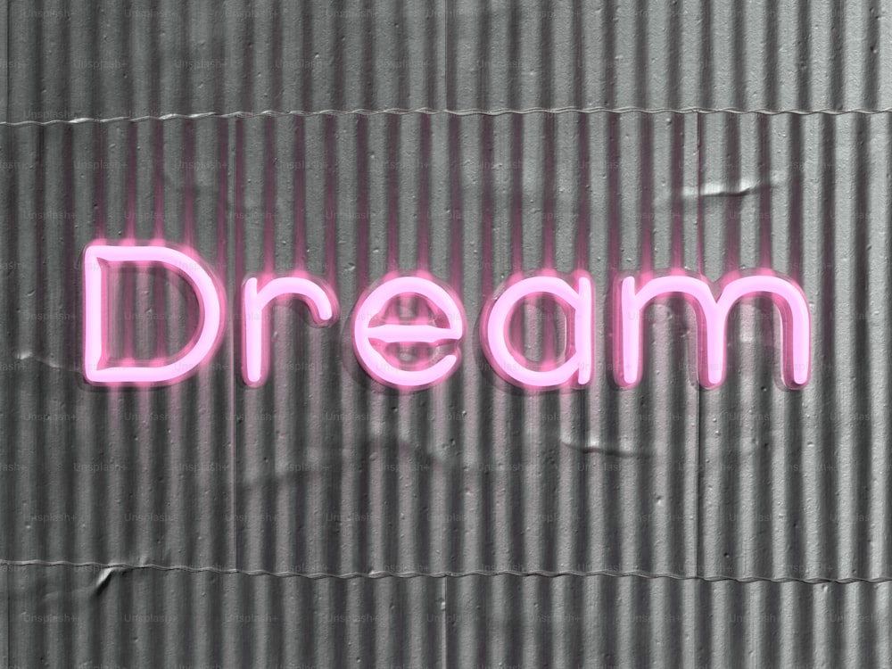 eine Leuchtreklame mit der Aufschrift Traum an einer Wand