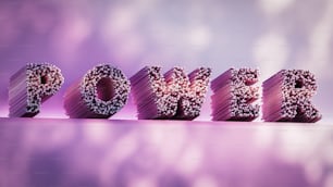 the word love spelled out of doughnuts in the shape of letters