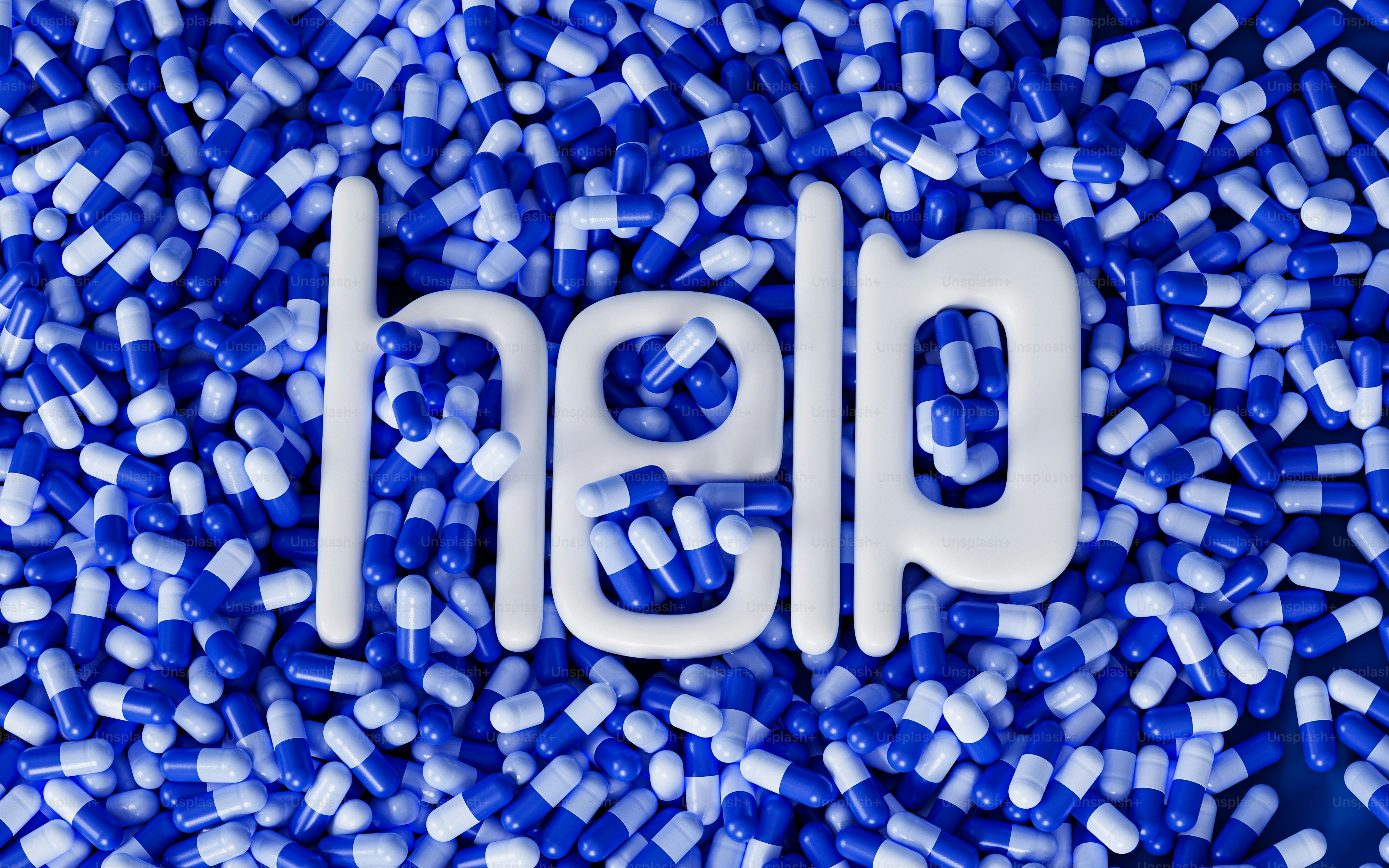 a pile of blue and white pills with the word hp on it