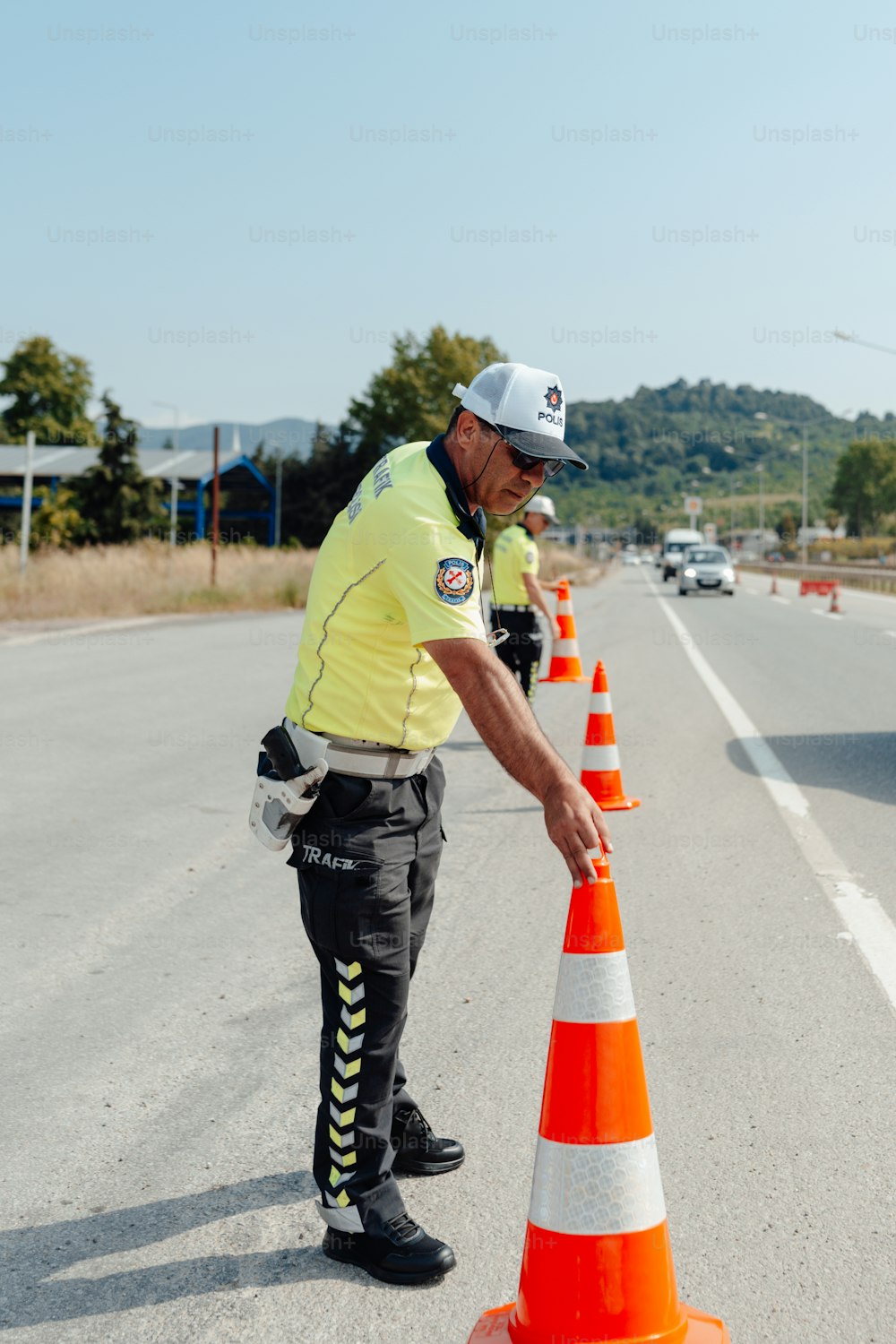 a police officer directing traffic on a highway