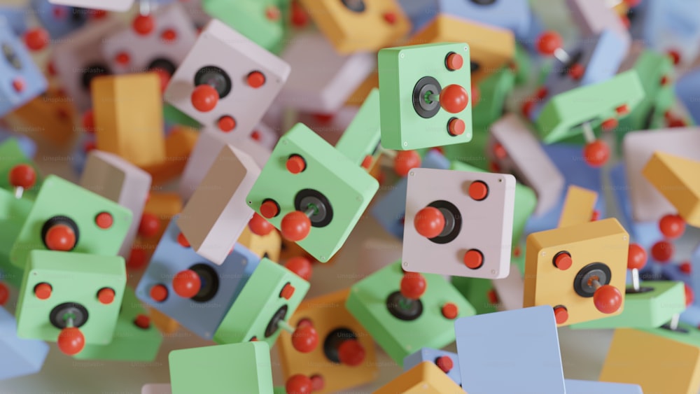 a bunch of small toy blocks with red buttons