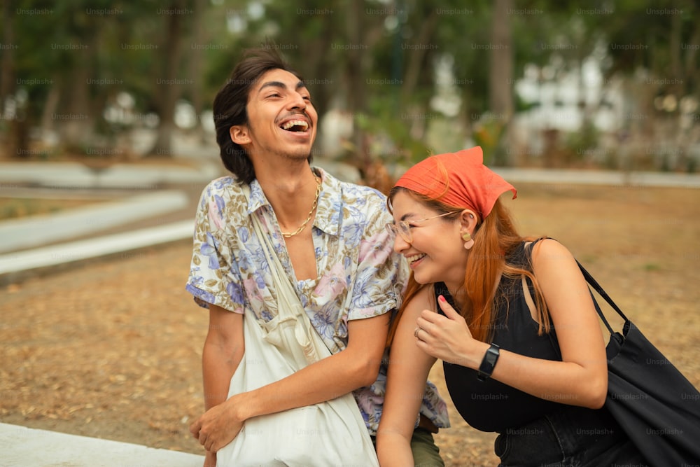 a man and a woman are laughing together