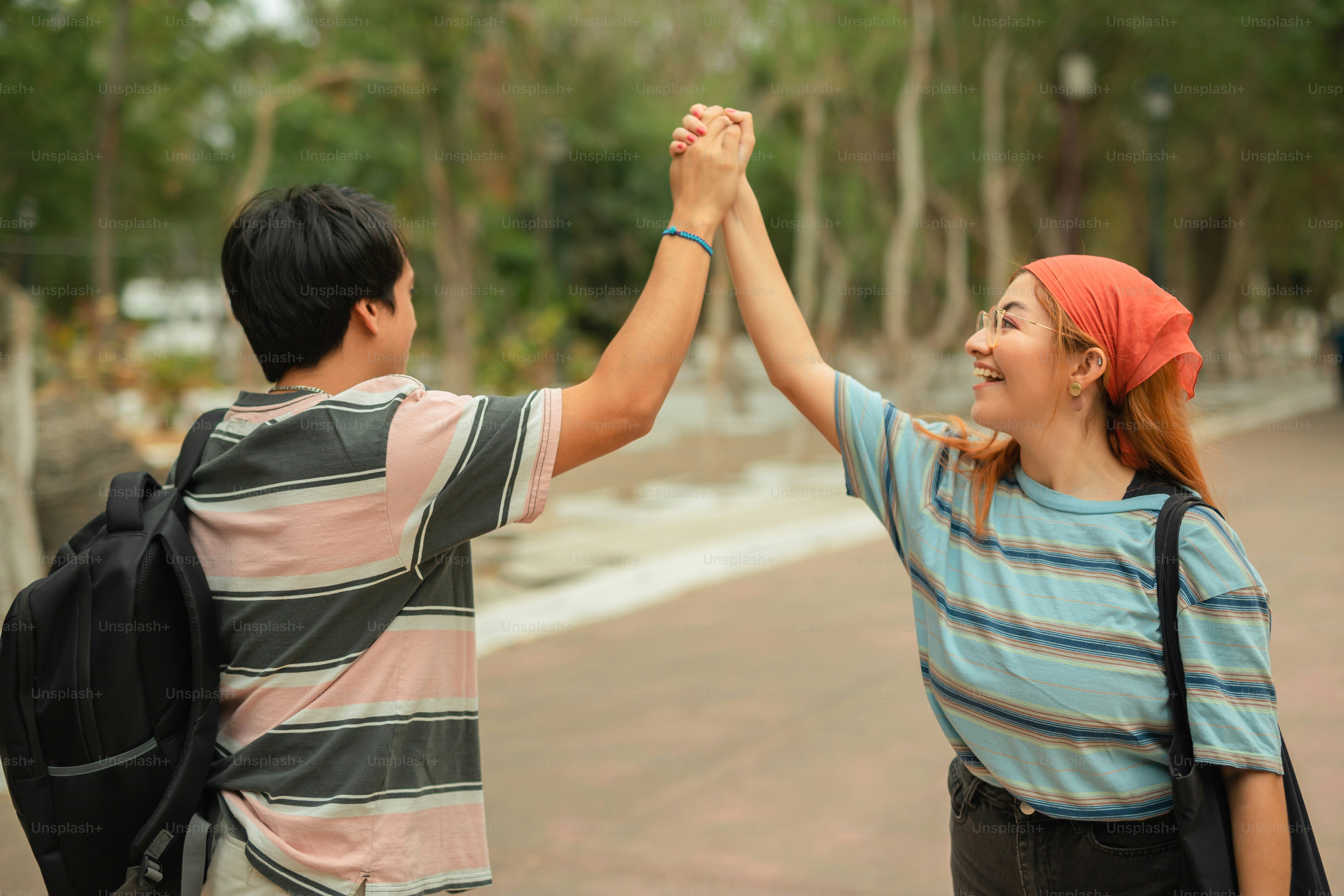 a couple of people that are holding hands