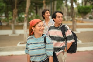 a group of people walking down a street