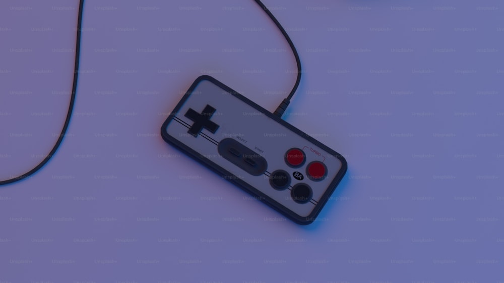 une manette de jeu vidéo est branchée sur un cordon