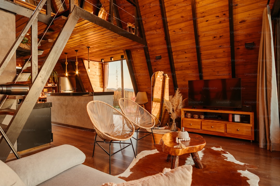 a living room filled with furniture and a fire place
