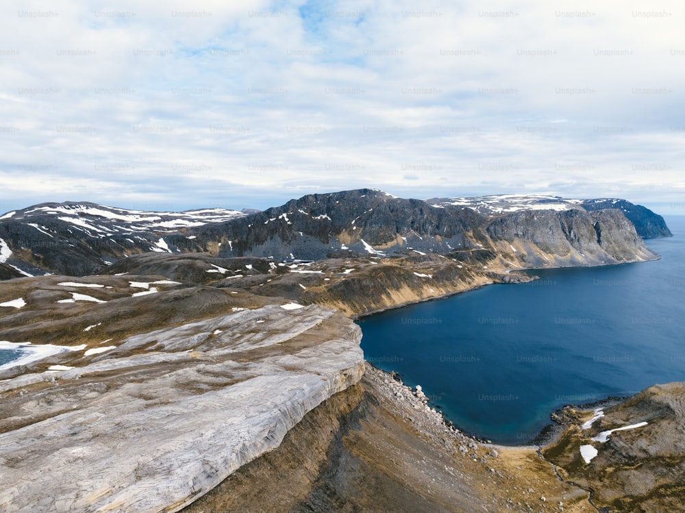 a large body of water surrounded by mountains