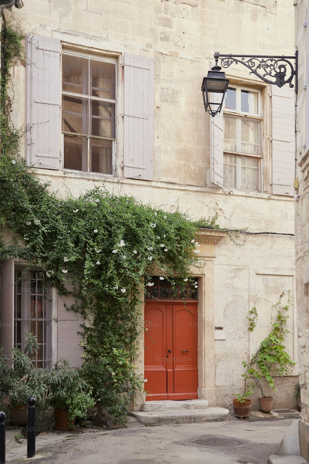 a building with a red door and window