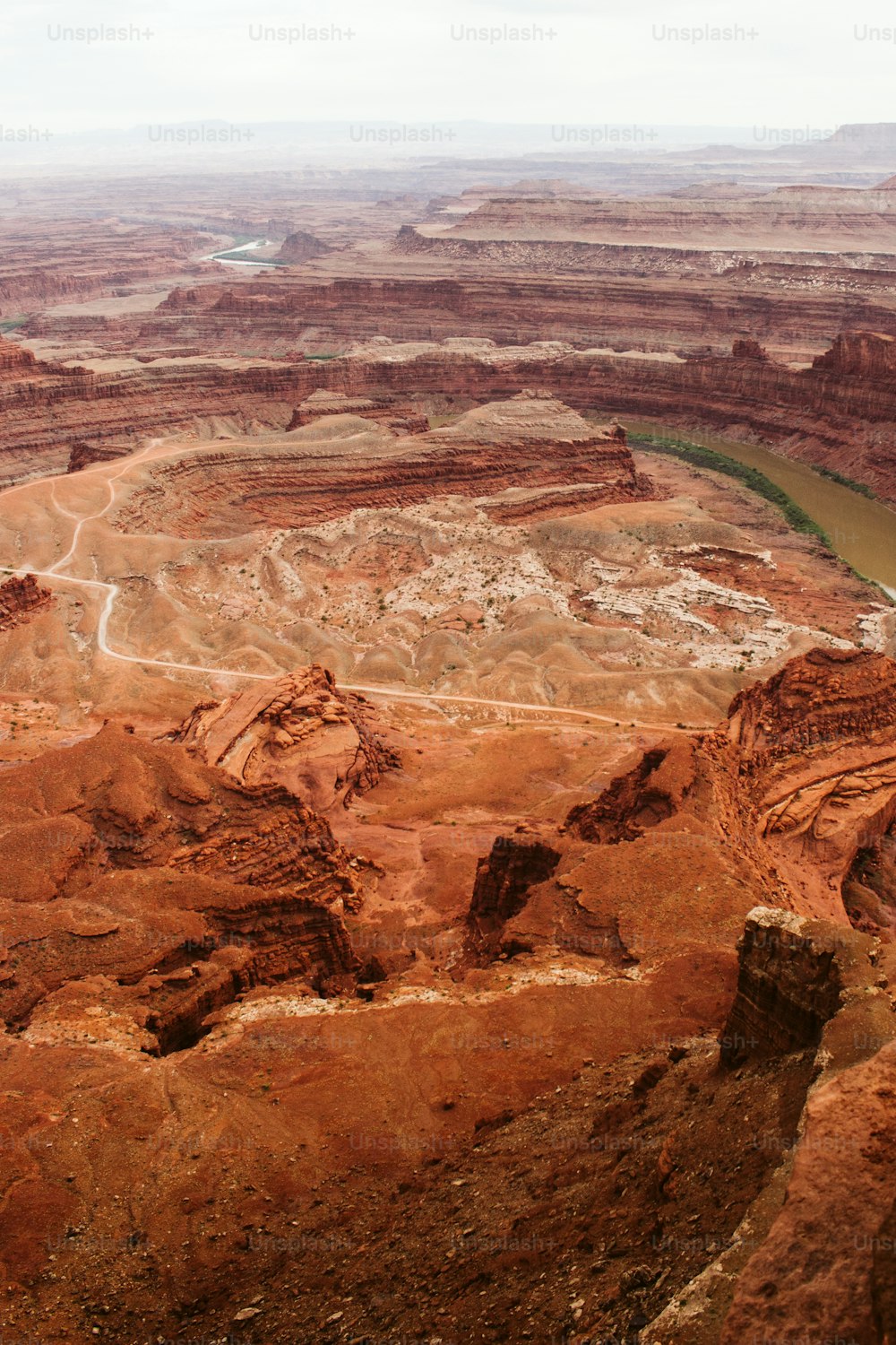 a view of a river in the middle of a canyon