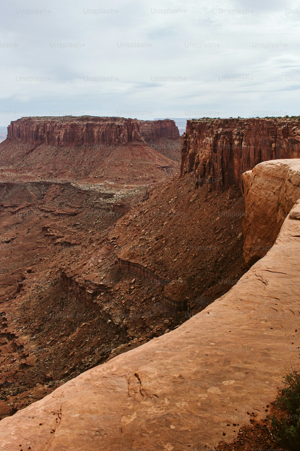 a view of a canyon from the top of a cliff