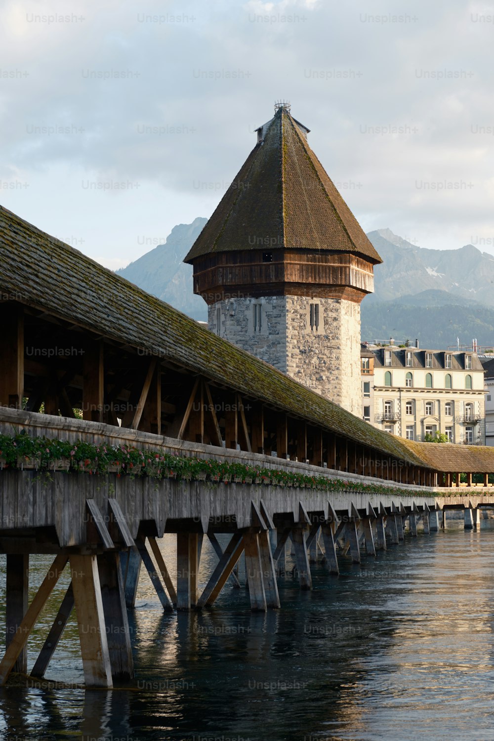 a bridge that has a tower on top of it