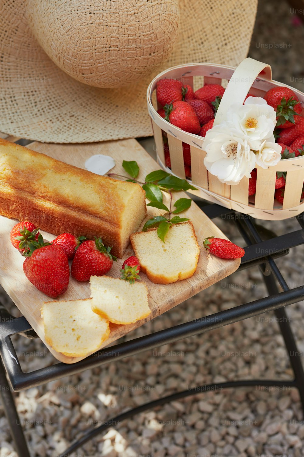 a table topped with slices of bread and strawberries