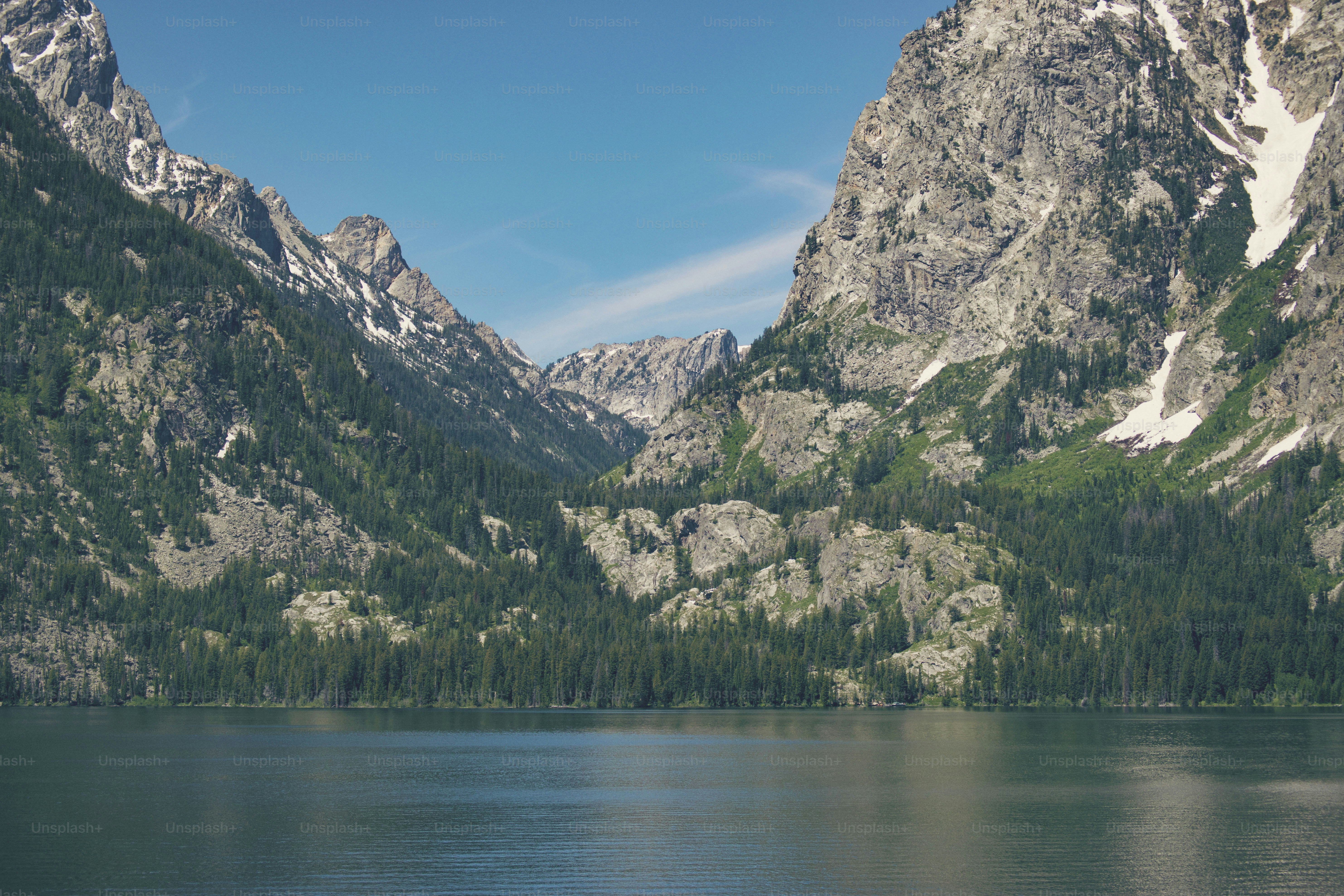 a large body of water surrounded by mountains