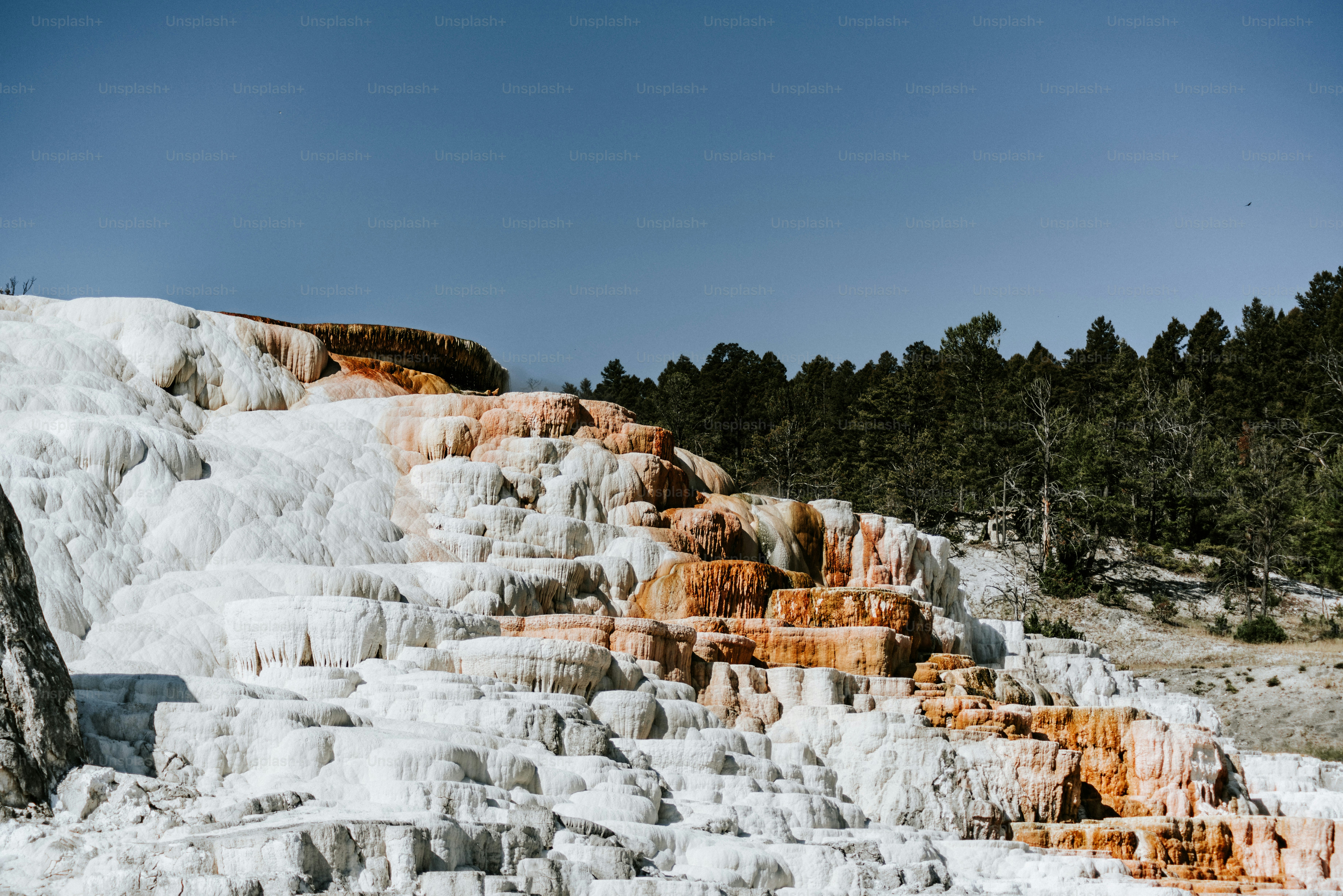 a mountain covered in lots of different colored rocks