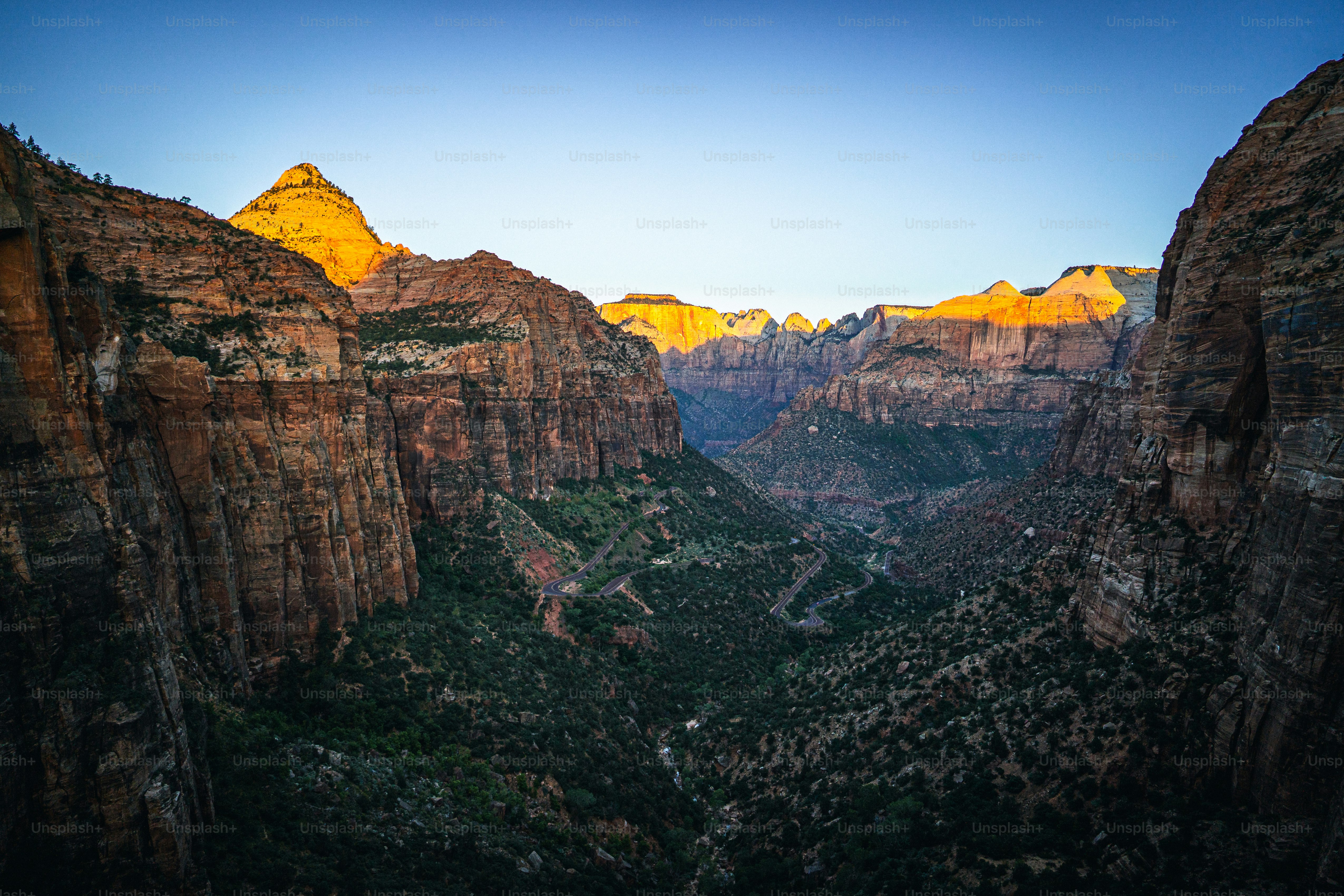 a view of the mountains from the top of a mountain