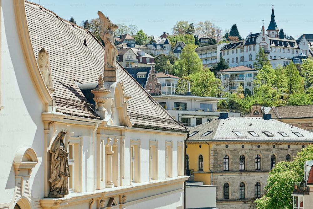 a view of a city with buildings and a clock tower