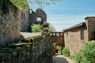 a stone building with a stone walkway leading to it