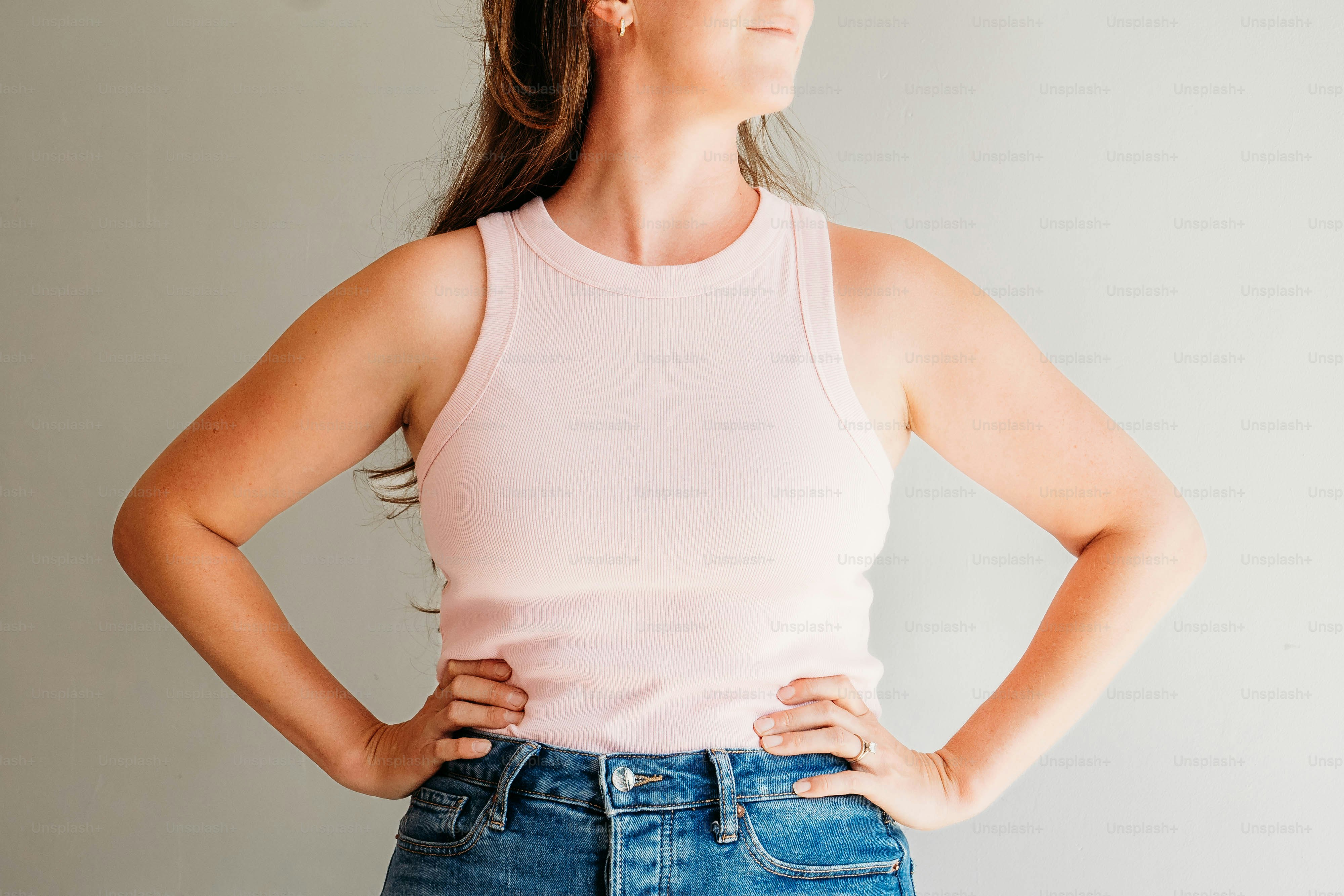 A woman standing with her hands on her hips photo – Fashion Image on ...