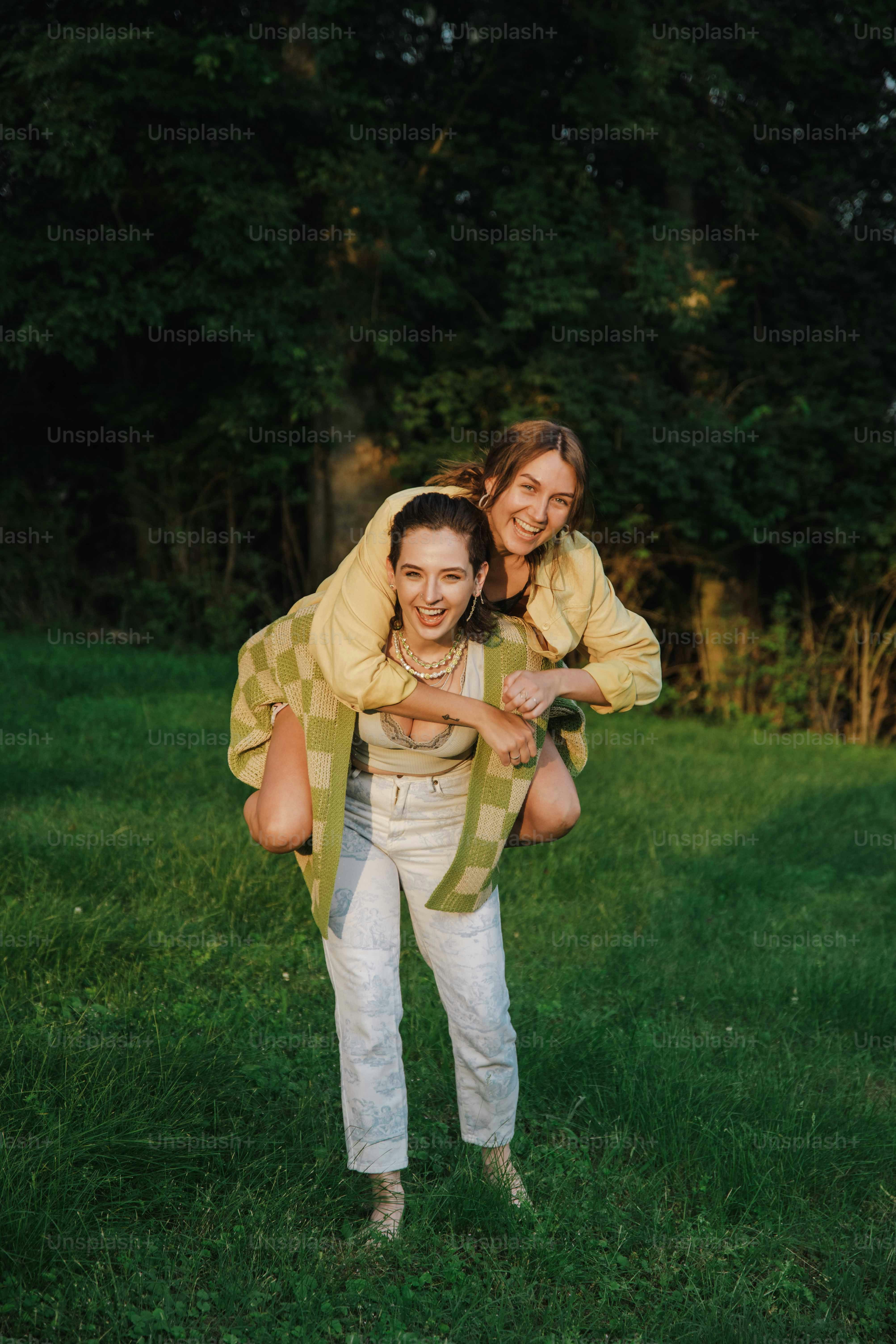 a woman carrying another woman on her back