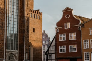 a tall building with a clock on the side of it