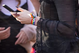 a close up of a person holding a cell phone