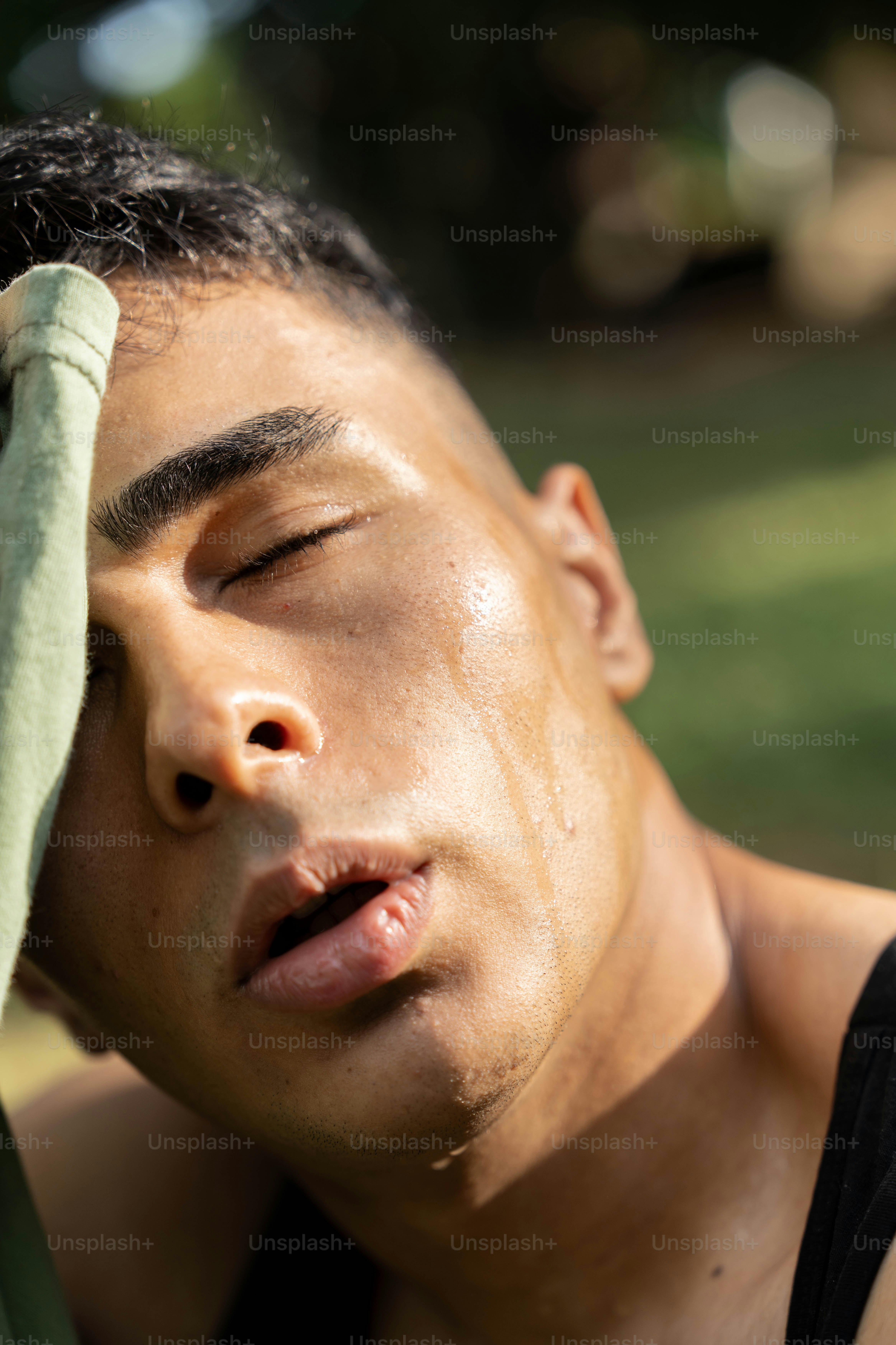 a man with a towel on his head