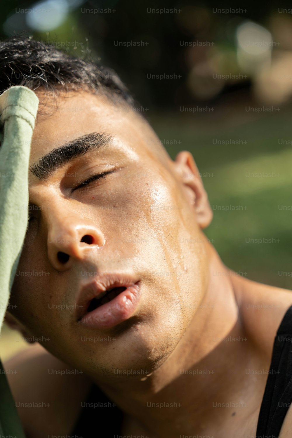 a man with a towel on his head